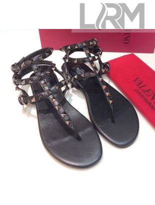 Valentino Rockstud Flat Thong Sandal in Leather Black 2020